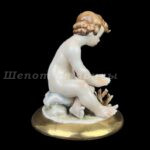 Лот. № 347 Статуэтка Путти Capodimonte Italy